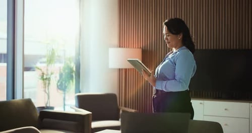 Happy, tablet and business Asian woman in office for finance report, research and investment