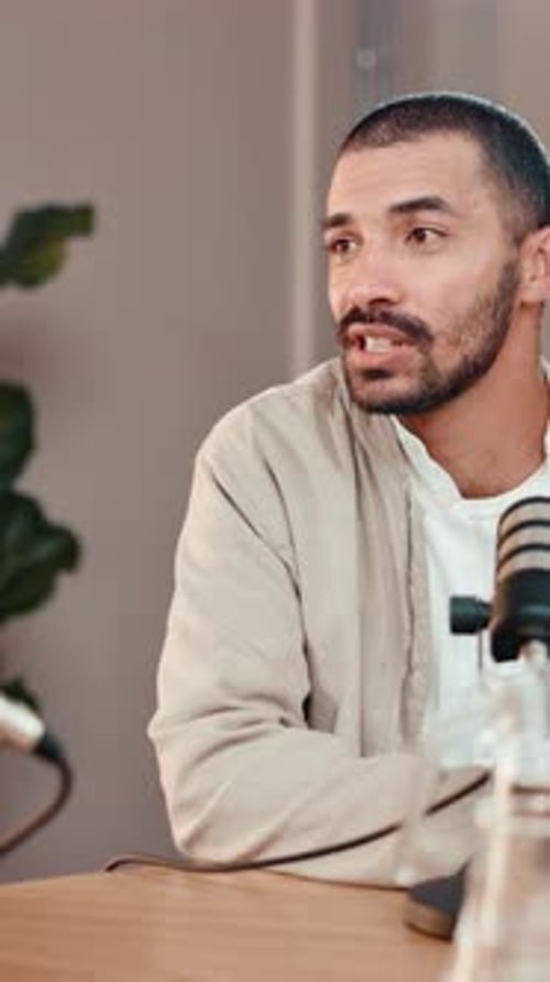 Man, talk and podcast recording with mic, interview or discussion for content creation at studio