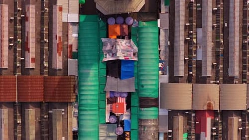 Aerial Top Down Perspective Flying Over Colorful Roofs and Stalls of Iconic Market Popular Tourist