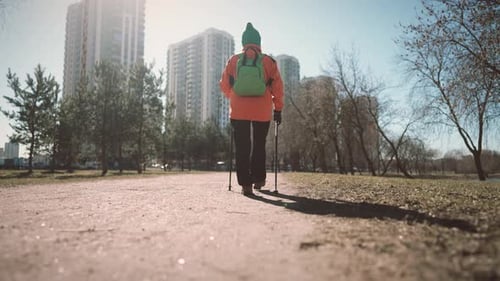 Trendy Nordic Walking for Old People for Stay Healthy and Active Old Lady Walk Back View of Aged