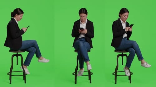 Modern Female Model Browsing Internet on Smartphone