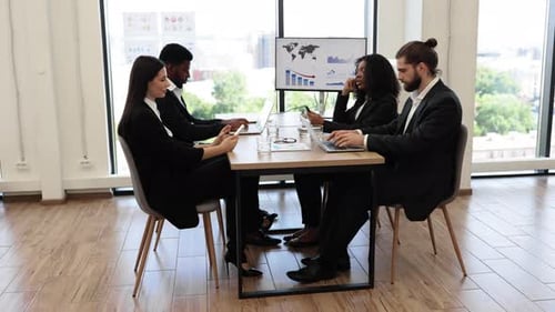 Diverse Business Team Meeting with Technology