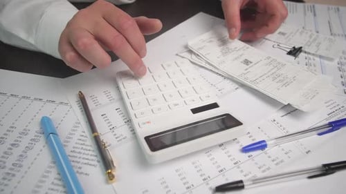 White Calculator Calculating