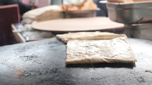 Cooking Turkish Food Pita Bread is Cooked on the Street