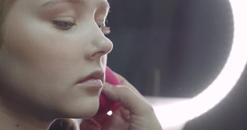 Close Up of Woman Receiving Makeup Application