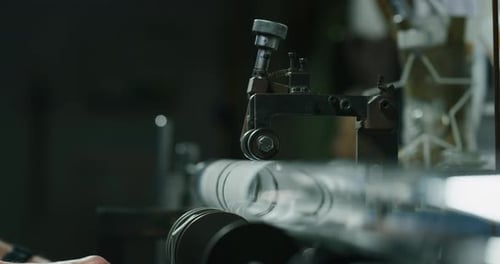 Precision Cutting Glass with Metal Machine in Workplace