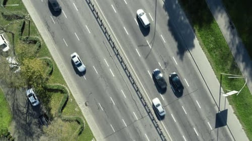Fast Turning Shot Above of Road with Moving Cars