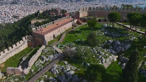 Aerial Video Alanya Castle s Strategic Location with a View of the Mediterranean Sea and Harbor