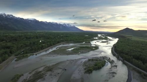Drone View Of Sunset Sky With Snowcapped Mountains And River 3