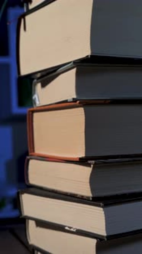 Pile of Books on a Desk, Close Up Footage