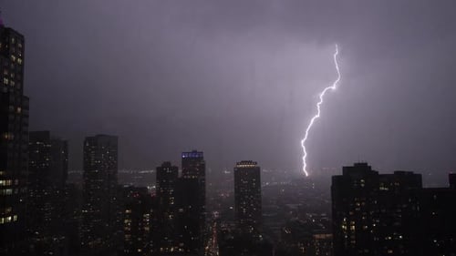 Enjoy the Dramatic Lightning Striking Over a City at Night a Powerful Display of Natures Energy