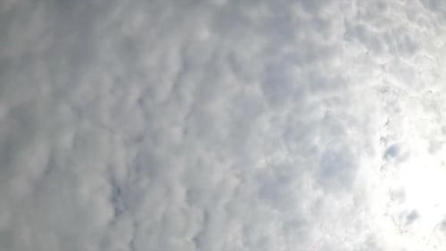 Stratus clouds spreading all over the sky. Rainy cloudscape formation in the atmosphere.