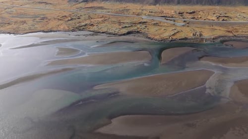 Panoramic Landscape Aerial Fly Glacial Black Rivers Iceland glacial flour water along geological sed