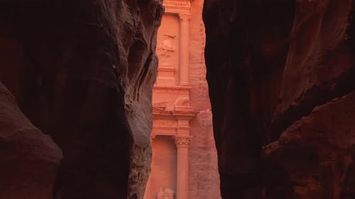 View of AlKhazneh The Treasury Seen Through the Siq Canyon Entrance in Petra Jordan