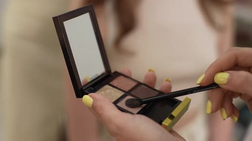 Closeup Cropped Shot of Unrecognizable Young Woman Doing Daily Makeup Close Up Hand with Brush