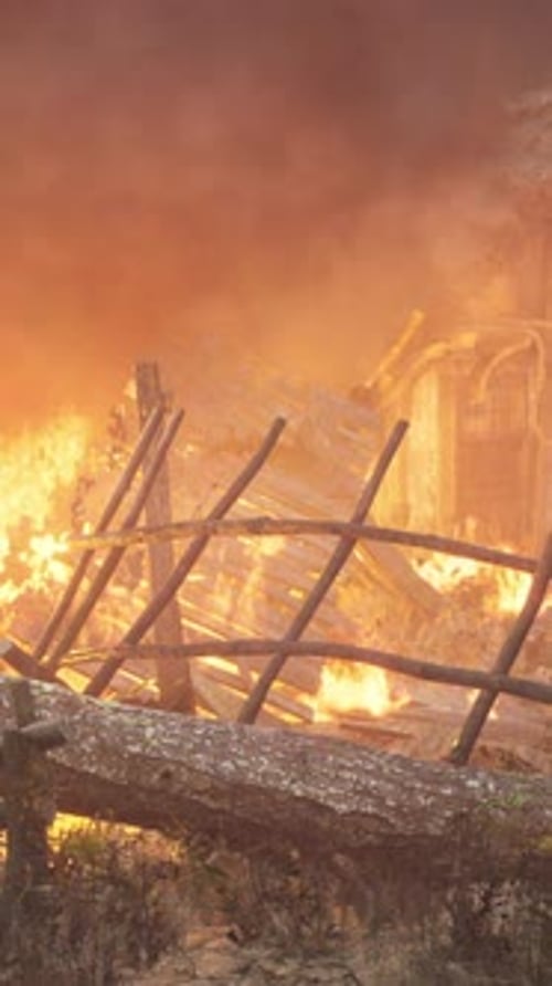 Burning Wooden House in Old Village