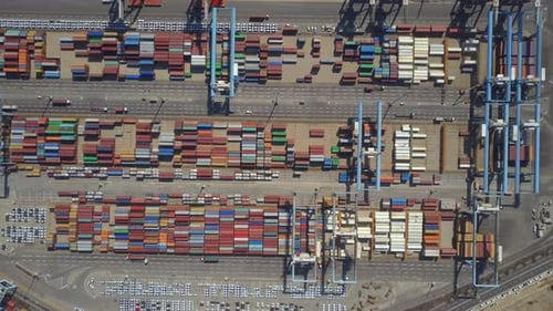 Aerial Time lapse - Container ship during loading and unloading