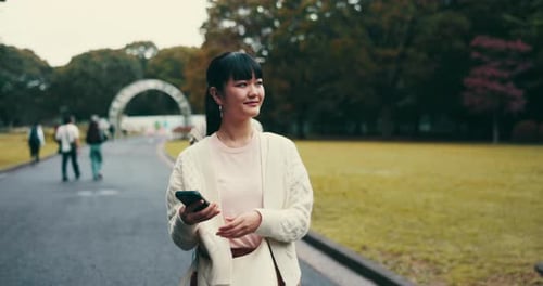 Asian women, hug or friends in park with surprise for bonding together, walking or funny joke