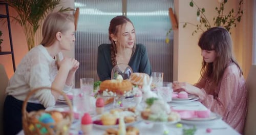 Sisters Talking At Home At Easter Breakfast At Home