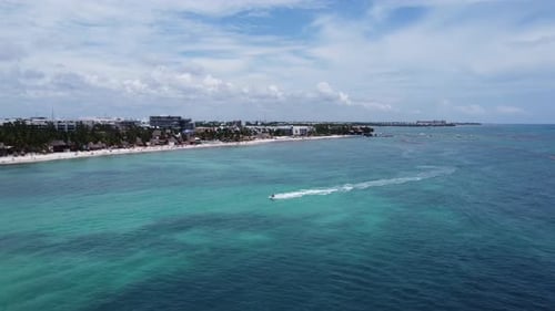 People riding a jet ski. Playa del Carmen, Mexico