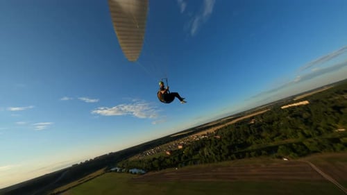 Paraglider Flying Above the Forest Fpv Drone Flies Above His Head