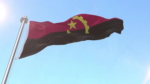 Realistic Angola Flag Waving Against Blue Sky
