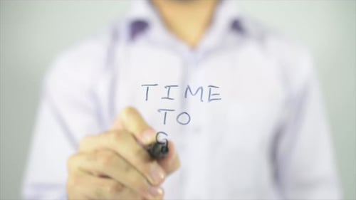 Hand Writing Message on Glass with Marker