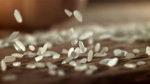 Rice Falls on the Table Filmed on a Highspeed Camera at 1000 Fps