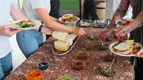 Colorful buffet vegan food and healthy people. Vegan food concept