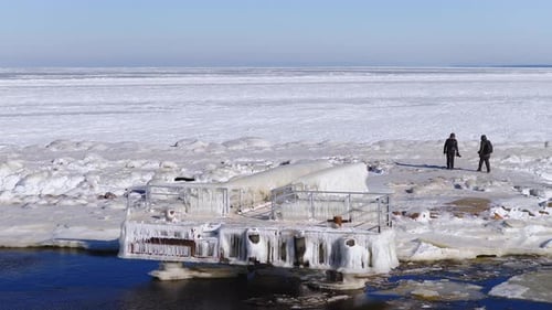 Aerial Mangalsala Lighthouse and Icy Pier Riga Latvia in Midwinter