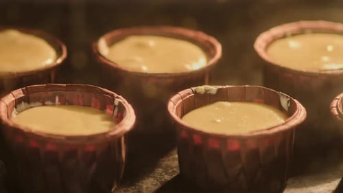 Cupcakes Rise Slowly While Baking Inside Oven