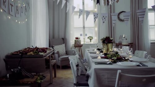 Festive Birthday Dinner Table Setup in Bright Room