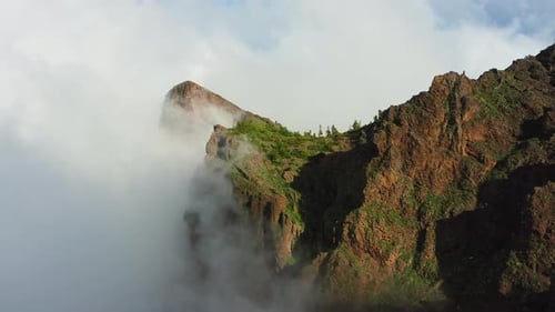 Dramatic Mountain Landscape with Swirling Clouds
