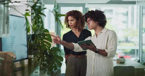 Tablet, office and business people in meeting with graph, statistics and research for financial