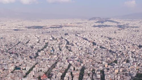 High aerial shot over sprawling Athens city Greece