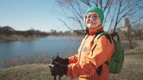 Happy Grandmother Living Active Life Doing Sport in Park and Hiking Portrait Charming Elderly Woman