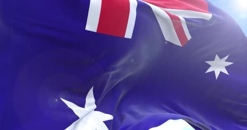 Realistic Waving Australian Flag on Blue Sky
