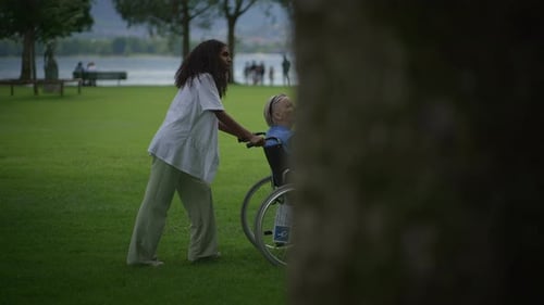 Engaging in Caring Interactions While Enjoying a Beautiful Scenic Park Setting Together with Others