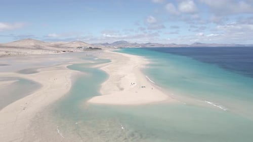 Beautiful kite surfers beach aerial view