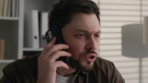 Close Up Angry Annoyed Displeased Business Man Caucasian Male Guy Talking Mobile Phone in Office