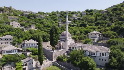 Aerial Parallax Shot Around Sisman Ibrahim Pasha Mosque In Historic Village Settlement Of Pocitelj.