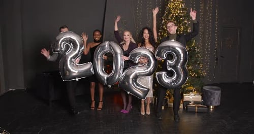 Friends Celebrate New Year with 2023 Balloons
