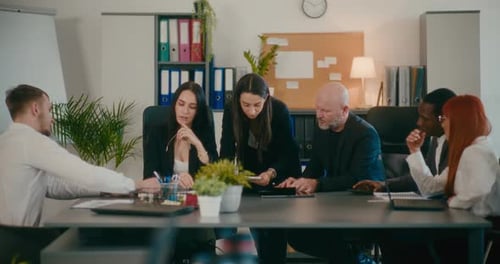 Colleagues Planning Business Strategy in Office