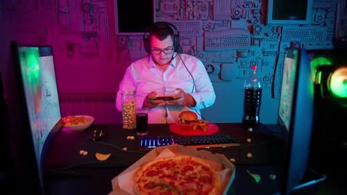 Gamer Playing Mobile Phone