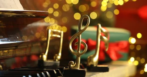 Christmas Piano with music note decoration and gift