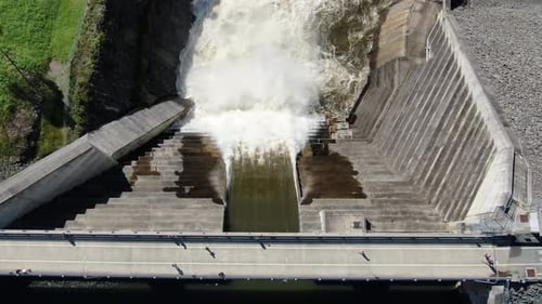 Water Flowing Over Dam Flooding Drone Vision