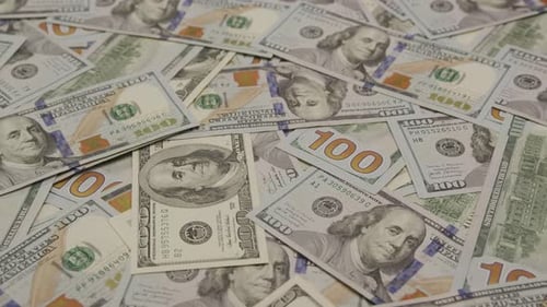 Pile of One Hundred Dollar Bills