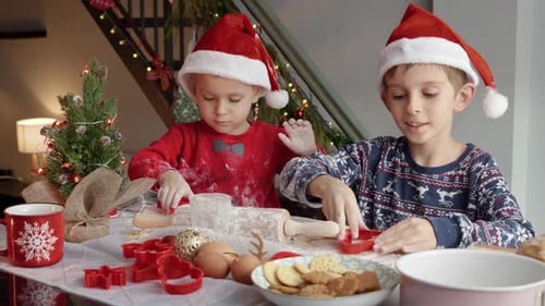 Children Making Christmas Cookies at Home