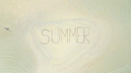 Top View of SUMMER Written on the Sand Surrounded By Crystal Clear Sea