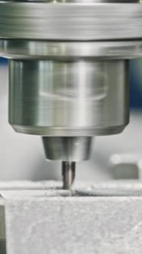High-precision milling machine in action at industrial site, close-up shot